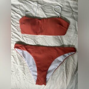 Lululemon reversible bikini. Orange ribbed colour and white on the other side